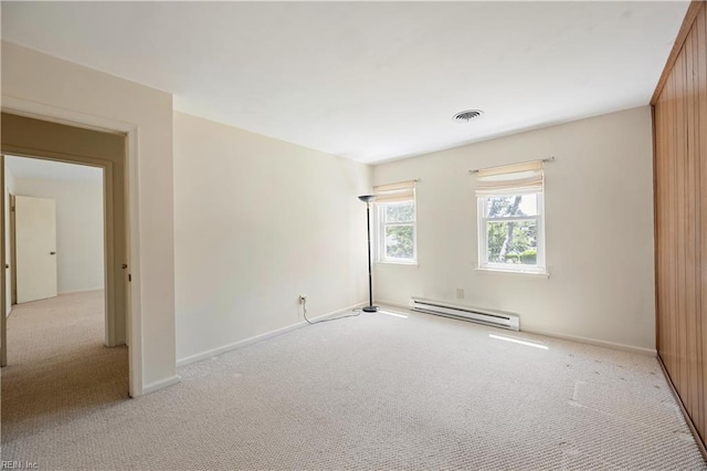 4456 Hudgins Dr, Virginia Beach, VA 23455 - empty room featuring a baseboard heating unit, carpet floors, and baseboards