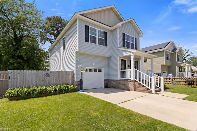 82 Beacon Rd, Portsmouth, VA 23702 - view of front of home with a garage, driveway, a porch, and board and batten siding