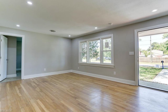 5833 Hedgerow Ln, Portsmouth, VA 23703 - empty room featuring light wood-style flooring, plenty of natural light, baseboards, and recessed lighting