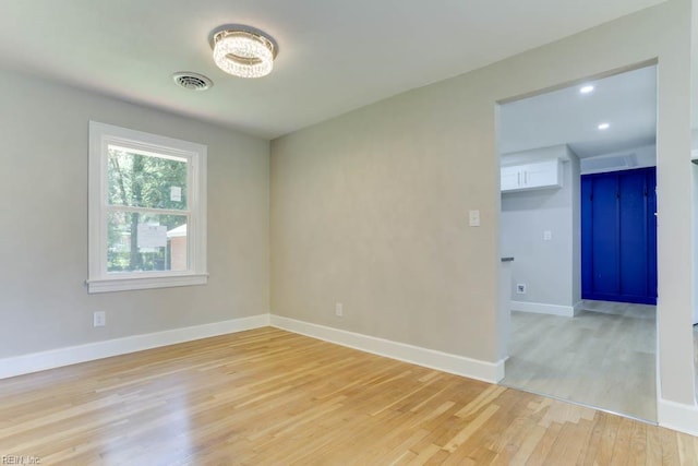 5833 Hedgerow Ln, Portsmouth, VA 23703 - unfurnished room featuring light wood-style flooring and baseboards
