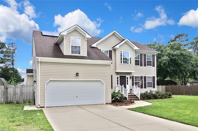 2805 Golden Ct, Chesapeake, VA 23323 - traditional home featuring roof mounted solar panels, driveway, and roof with shingles