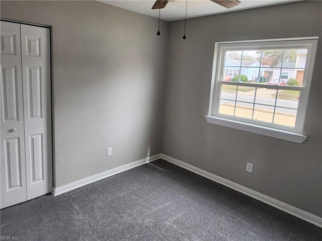 1 Maume Cir, Hampton, VA 23666 - spare room with ceiling fan, dark colored carpet, and baseboards