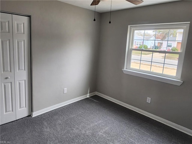 1 Maume Cir, Hampton, VA 23666 - spare room with ceiling fan, dark colored carpet, and baseboards