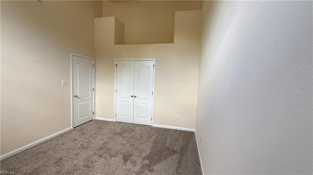 2019 River Pearl Way, Chesapeake, VA 23321 - unfurnished bedroom with carpet floors, a high ceiling, baseboards, and a closet