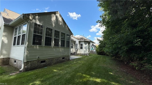 2019 River Pearl Way, Chesapeake, VA 23321 - view of side of property with crawl space and a lawn
