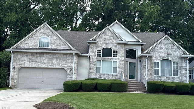 2019 River Pearl Way, Chesapeake, VA 23321 - french country style house with stone siding, concrete driveway, and a front lawn