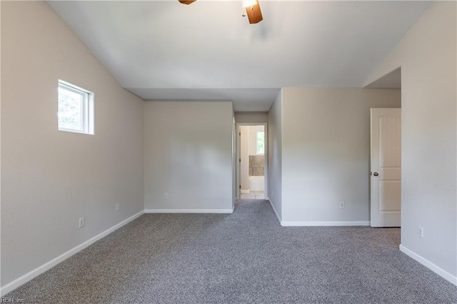 429 Draper Dr, Norfolk, VA 23505 - spare room featuring carpet, vaulted ceiling, healthy amount of natural light, and ceiling fan