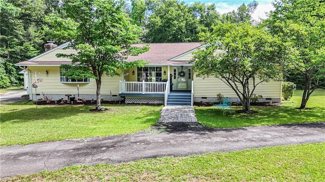 201 Colony Trl, Lanexa, VA 23089 - view of front of house with crawl space, a porch, a front yard, and a chimney