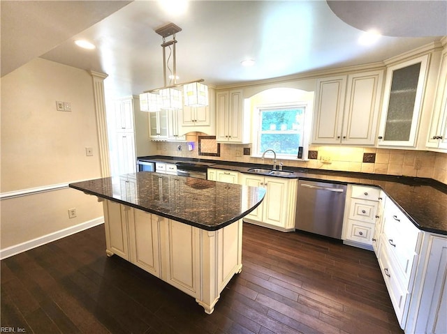 5097 Rochelle Rd, Virginia Beach, VA 23464 - kitchen with appliances with stainless steel finishes, a sink, dark wood-style flooring, decorative backsplash, and recessed lighting