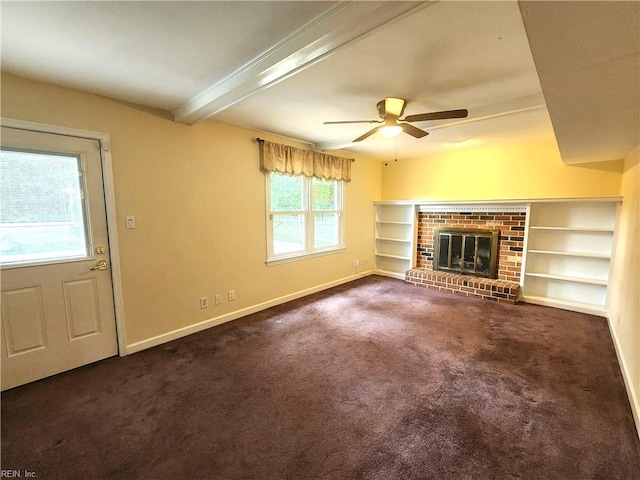 5097 Rochelle Rd, Virginia Beach, VA 23464 - unfurnished living room with baseboards, carpet, a ceiling fan, a brick fireplace, and beam ceiling