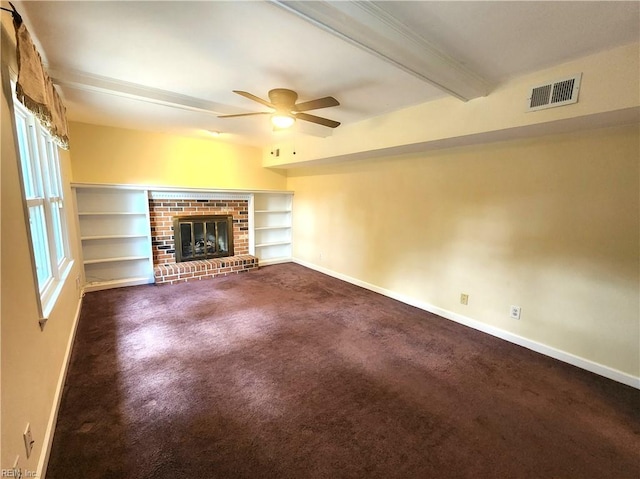 5097 Rochelle Rd, Virginia Beach, VA 23464 - unfurnished living room with beam ceiling, baseboards, ceiling fan, carpet flooring, and a fireplace