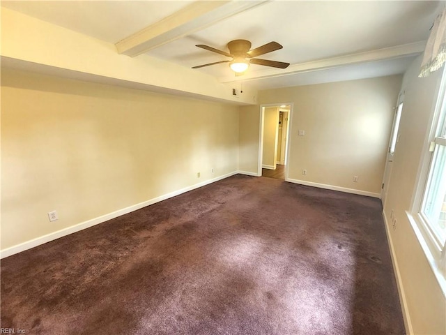 5097 Rochelle Rd, Virginia Beach, VA 23464 - empty room featuring a ceiling fan, dark carpet, beamed ceiling, and baseboards