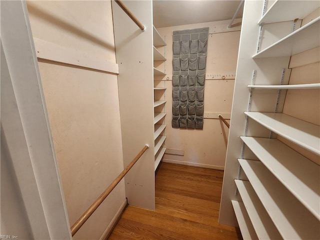 5097 Rochelle Rd, Virginia Beach, VA 23464 - walk in closet with wood finished floors