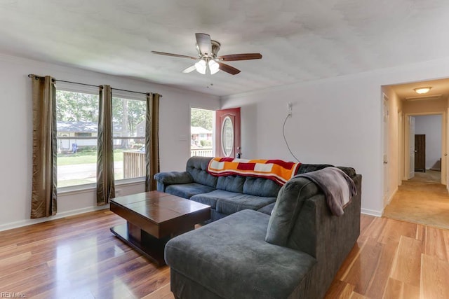 1621 Bill St, Norfolk, VA 23518 - living area with a ceiling fan, light wood-style floors, and baseboards