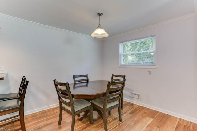 1621 Bill St, Norfolk, VA 23518 - dining room with crown molding, light wood-style flooring, and baseboards