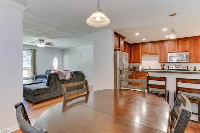 1621 Bill St, Norfolk, VA 23518 - dining room with a ceiling fan, light wood-type flooring, recessed lighting, and ornamental molding