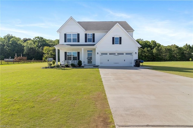 110 Georgia Dr, Elizabeth City, NC 27909 - traditional home featuring a porch, driveway, a garage, and a front lawn