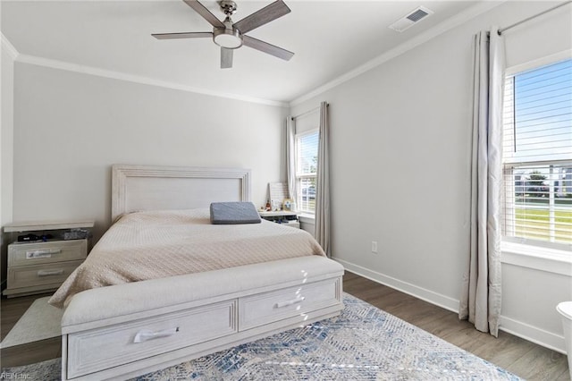 110 Georgia Dr, Elizabeth City, NC 27909 - bedroom with wood finished floors, ornamental molding, baseboards, and a ceiling fan