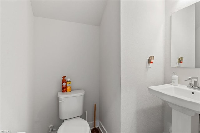 110 Georgia Dr, Elizabeth City, NC 27909 - half bathroom featuring toilet and a sink