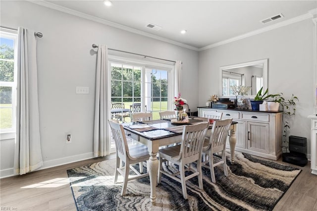 110 Georgia Dr, Elizabeth City, NC 27909 - dining space with light wood-style flooring, ornamental molding, baseboards, and recessed lighting