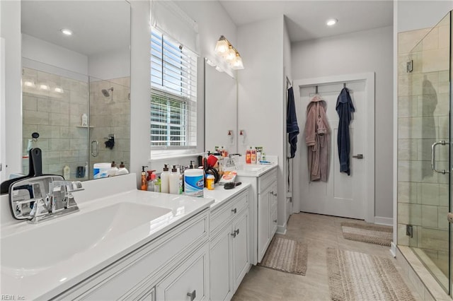 110 Georgia Dr, Elizabeth City, NC 27909 - bathroom with a stall shower, double vanity, recessed lighting, and tile patterned floors