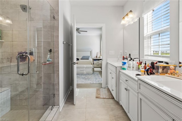 110 Georgia Dr, Elizabeth City, NC 27909 - ensuite bathroom featuring vanity, a shower stall, tile patterned flooring, and a ceiling fan