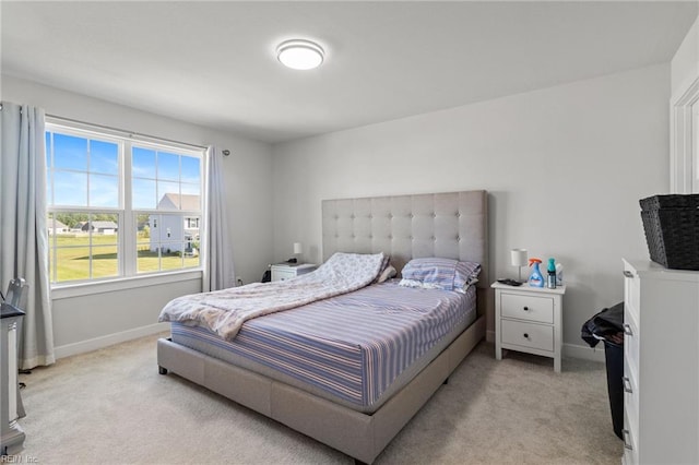 110 Georgia Dr, Elizabeth City, NC 27909 - bedroom featuring light colored carpet and baseboards