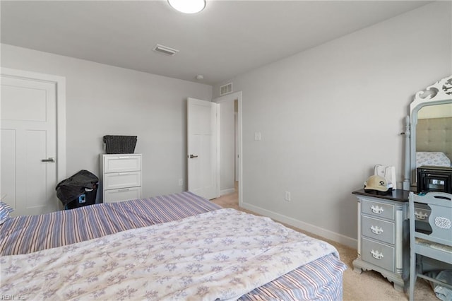110 Georgia Dr, Elizabeth City, NC 27909 - bedroom with baseboards and light carpet