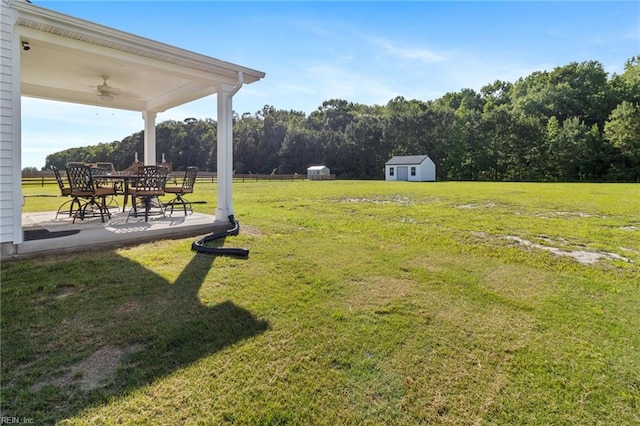 110 Georgia Dr, Elizabeth City, NC 27909 - view of green lawn with a ceiling fan and a patio area