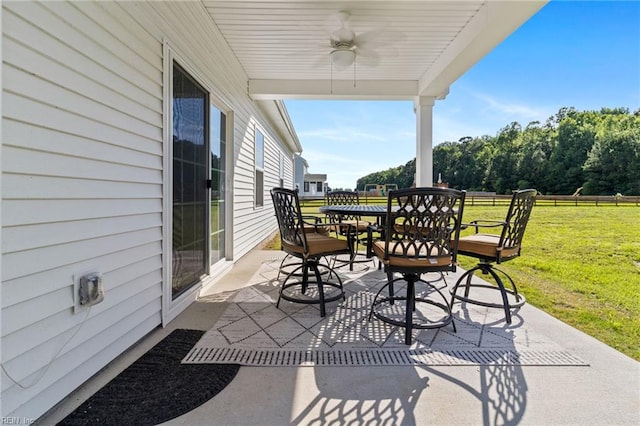110 Georgia Dr, Elizabeth City, NC 27909 - view of patio with outdoor dining area and a ceiling fan