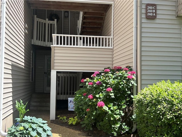 240 Dockside Dr Unit C, Hampton, VA 23669 - view of exterior entry with a balcony
