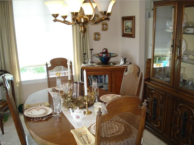 240 Dockside Dr Unit C, Hampton, VA 23669 - dining space featuring a chandelier