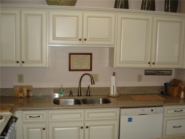 240 Dockside Dr Unit C, Hampton, VA 23669 - kitchen with cream cabinets, dishwasher, a sink, and light stone countertops