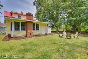 337 Juniper Cove Ln, Bohannon, VA 23021 - back of property with a lawn and a chimney