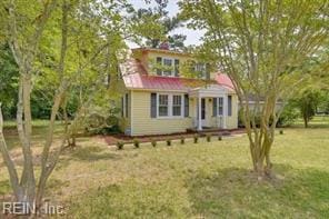 337 Juniper Cove Ln, Bohannon, VA 23021 - traditional-style home featuring a front yard