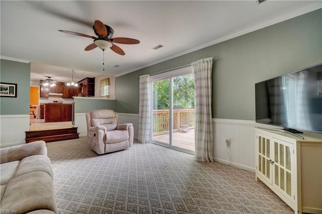 7 Saint Francis Dr, Newport News, VA 23602 - carpeted living room featuring a ceiling fan, wainscoting, and ornamental molding