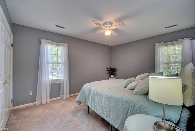 7 Saint Francis Dr, Newport News, VA 23602 - bedroom featuring light carpet, baseboards, and a ceiling fan