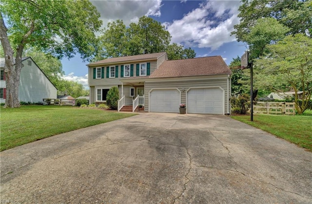 7 Saint Francis Dr, Newport News, VA 23602 - view of front facade with an attached garage and driveway