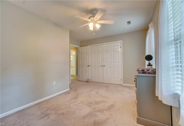 7 Saint Francis Dr, Newport News, VA 23602 - bedroom with light colored carpet, baseboards, a closet, and a ceiling fan