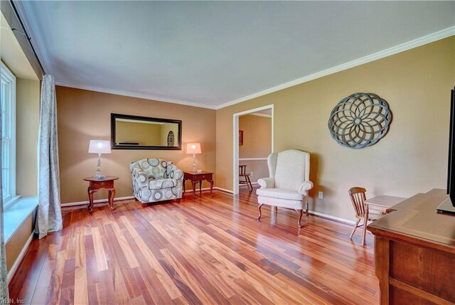 7 Saint Francis Dr, Newport News, VA 23602 - sitting room with wood finished floors, baseboards, and crown molding