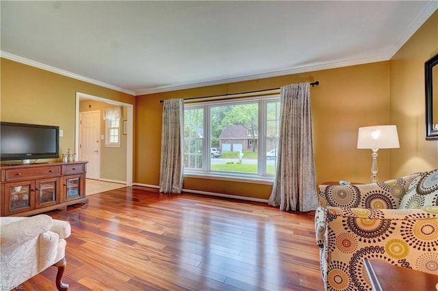 7 Saint Francis Dr, Newport News, VA 23602 - living room featuring ornamental molding, wood finished floors, and baseboards