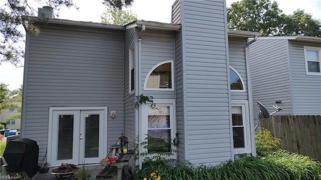 709 Roosevelt Ave, Virginia Beach, VA 23452 - back of property featuring a chimney and french doors