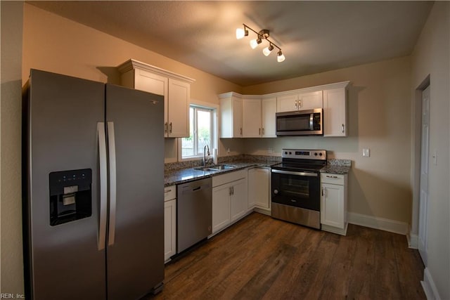 3032 Grandy Ave, Norfolk, VA 23509 - kitchen with stainless steel appliances, white cabinets, and dark stone countertops