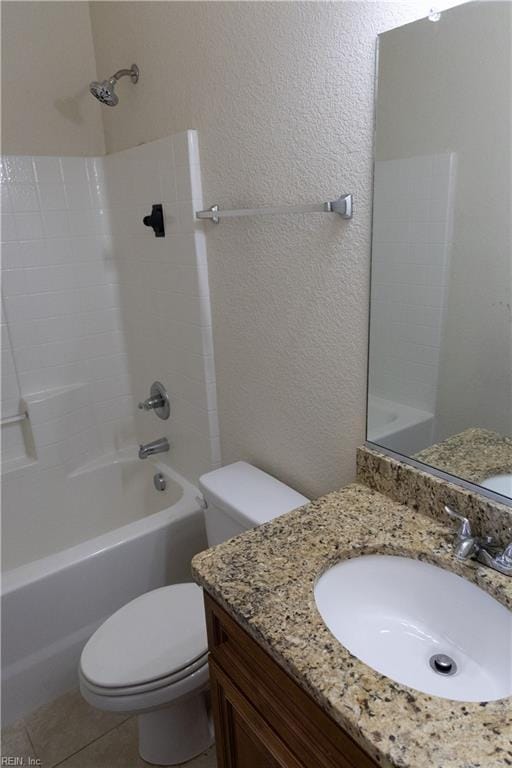 1932 Linster St, Chesapeake, VA 23324 - bathroom featuring toilet, vanity, shower / bath combination, a textured wall, and tile patterned flooring