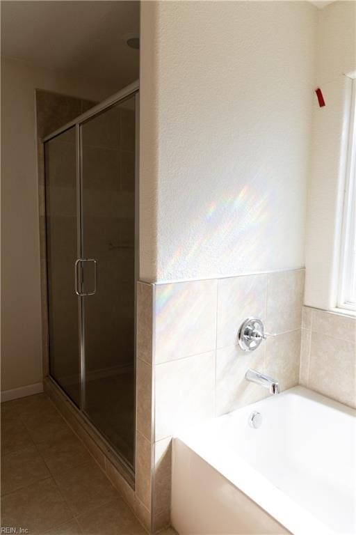 1932 Linster St, Chesapeake, VA 23324 - bathroom featuring a garden tub, a shower stall, and tile patterned flooring