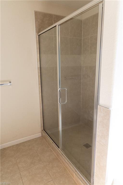 1932 Linster St, Chesapeake, VA 23324 - bathroom with tile patterned flooring, a shower stall, and baseboards