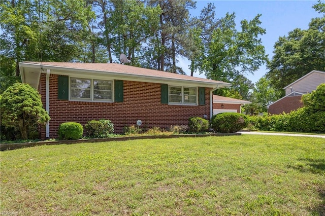 8 Marilea Cir, Newport News, VA 23606 - view of front of home featuring a front lawn, brick siding, and a garage