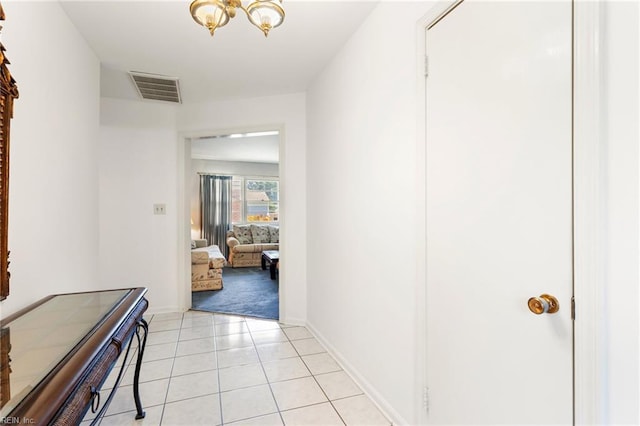 8 Marilea Cir, Newport News, VA 23606 - hallway featuring a chandelier and light tile patterned flooring