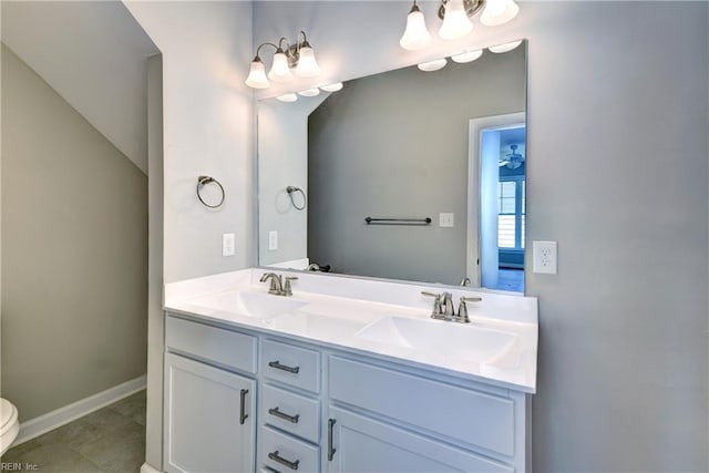 3545 Amberley Way, Williamsburg, VA 23188 - bathroom featuring toilet, double vanity, and baseboards