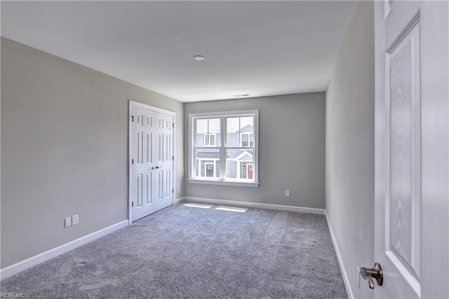 3545 Amberley Way, Williamsburg, VA 23188 - carpeted empty room with baseboards